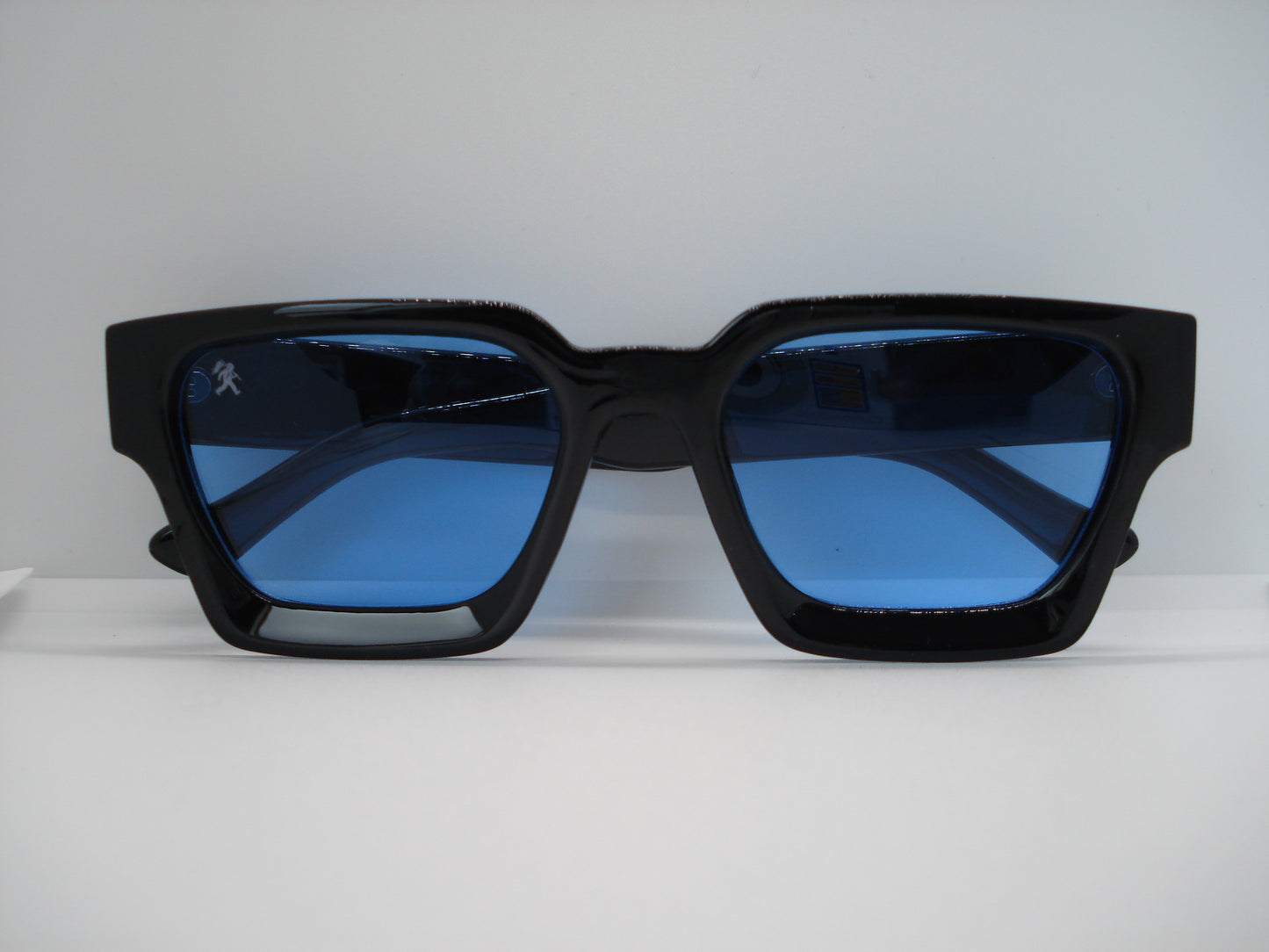 GRANDJOUER® Akura Shades – Black Frame Blue Lens